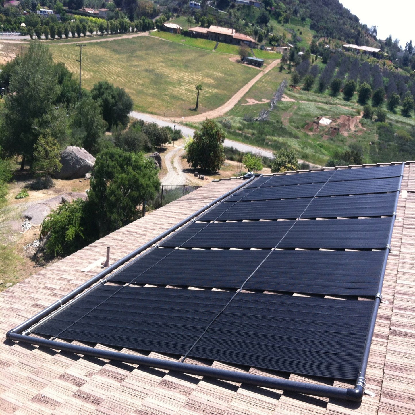 SwimEasy High-Performance Solar Pool Heater Panel Replacement - Highest Performing Design - 15-20 Year Life Expectancy (Includes 4 Heavy-Duty Rubber Hose Connectors)